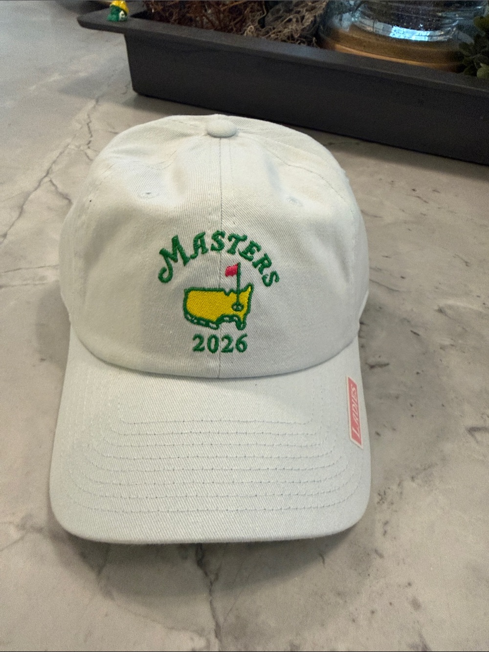 Masters White Baseball Hat with Green and Yellow Embroidered Logo